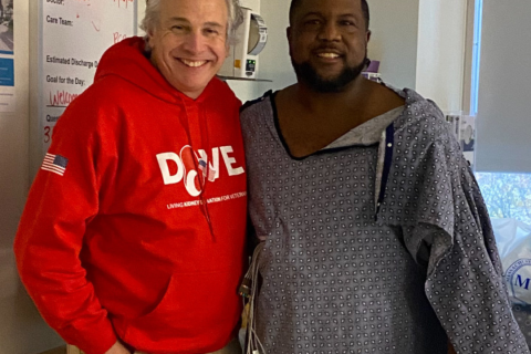 Steve, left, visiting Kevin in the hospital after Kevin's transplant surgery.