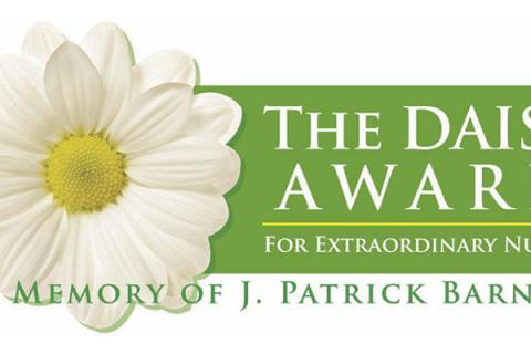 The Daisy Award logo with white daisy and green background.