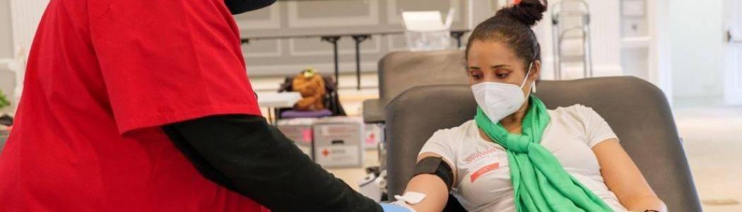 person donating blood to the Red Cross