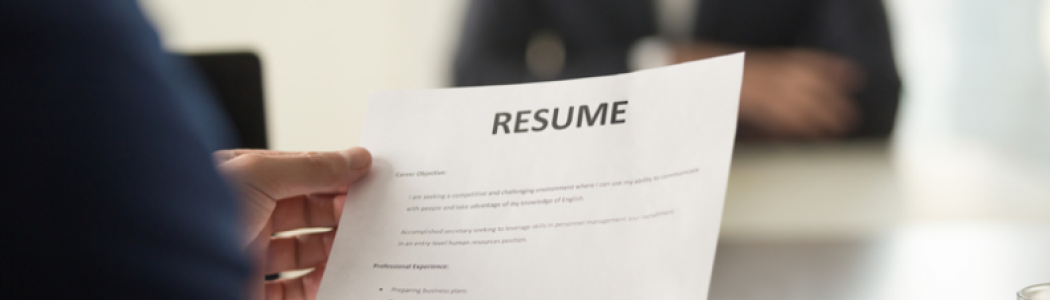 A person holding a resume