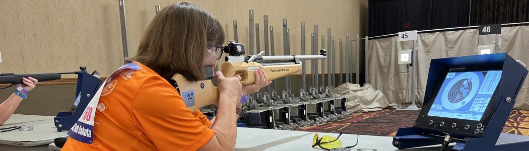 women shooting air rifle