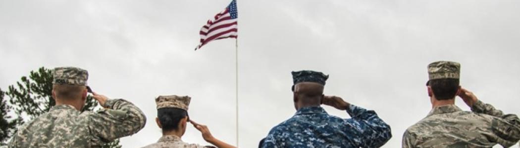 army saluting to american flag