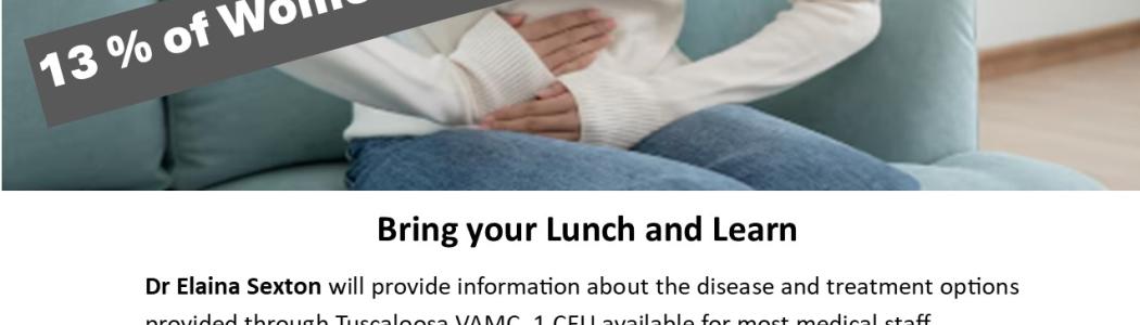 Woman on couch holding stomach