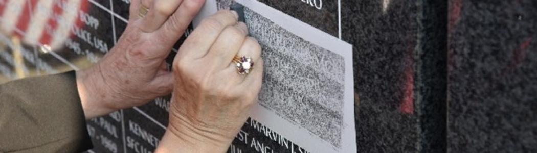 Inscription being placed on the permanent granite tribute at VA Central California, honoring the legacies of nearly 2,000 local heroes.