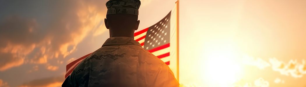 Soldier and America Flag at Sunset