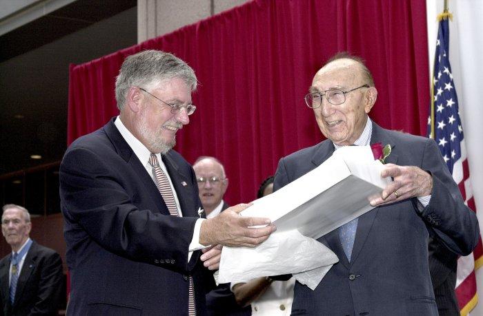 Dr. Michael E. DeBakey with Medical Center Director Edgar L. Tucker.