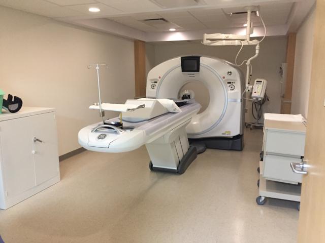 Photo of GE Revolution Evo 128 slice CT scanner.