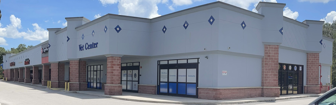 Lakeland Vet Center located adjacent to Pizza Hut, a few doors down from Rent-A-Center, and Amscot on Ariana St. Location is in shopping center which is directly across from American Legion Post 4.