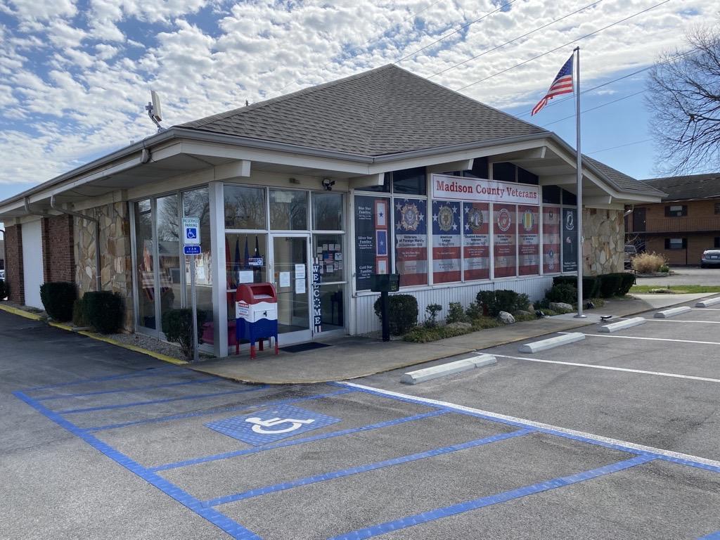 Picture of Madison County Veteran Outreach Center with Flag.