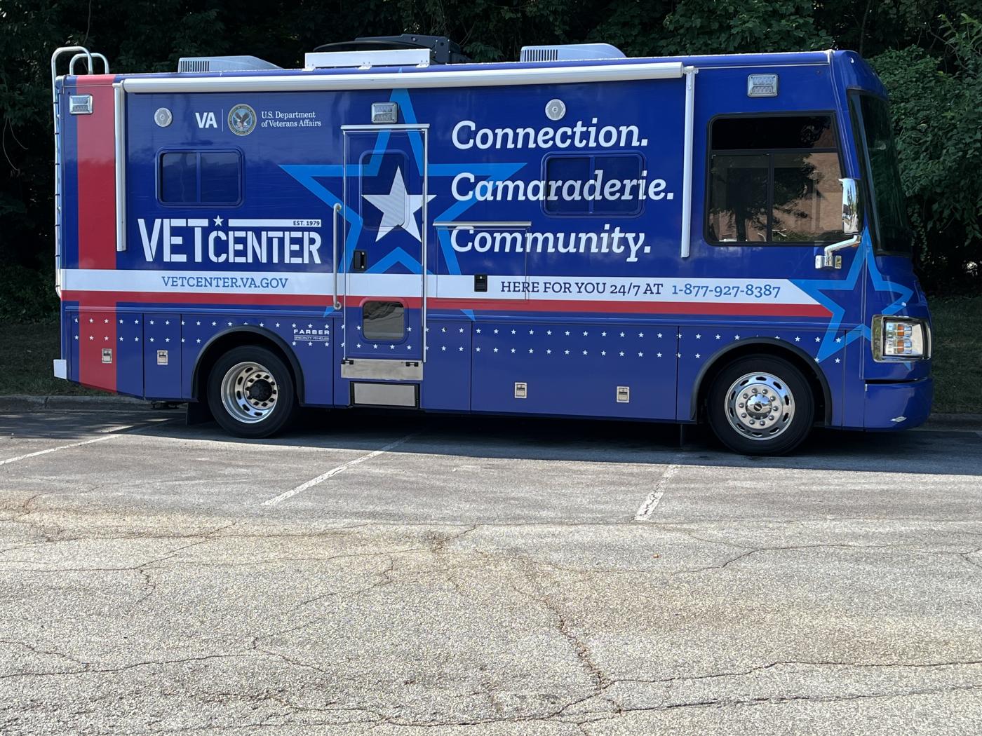 Blue RV with Vet Center logo and wrap