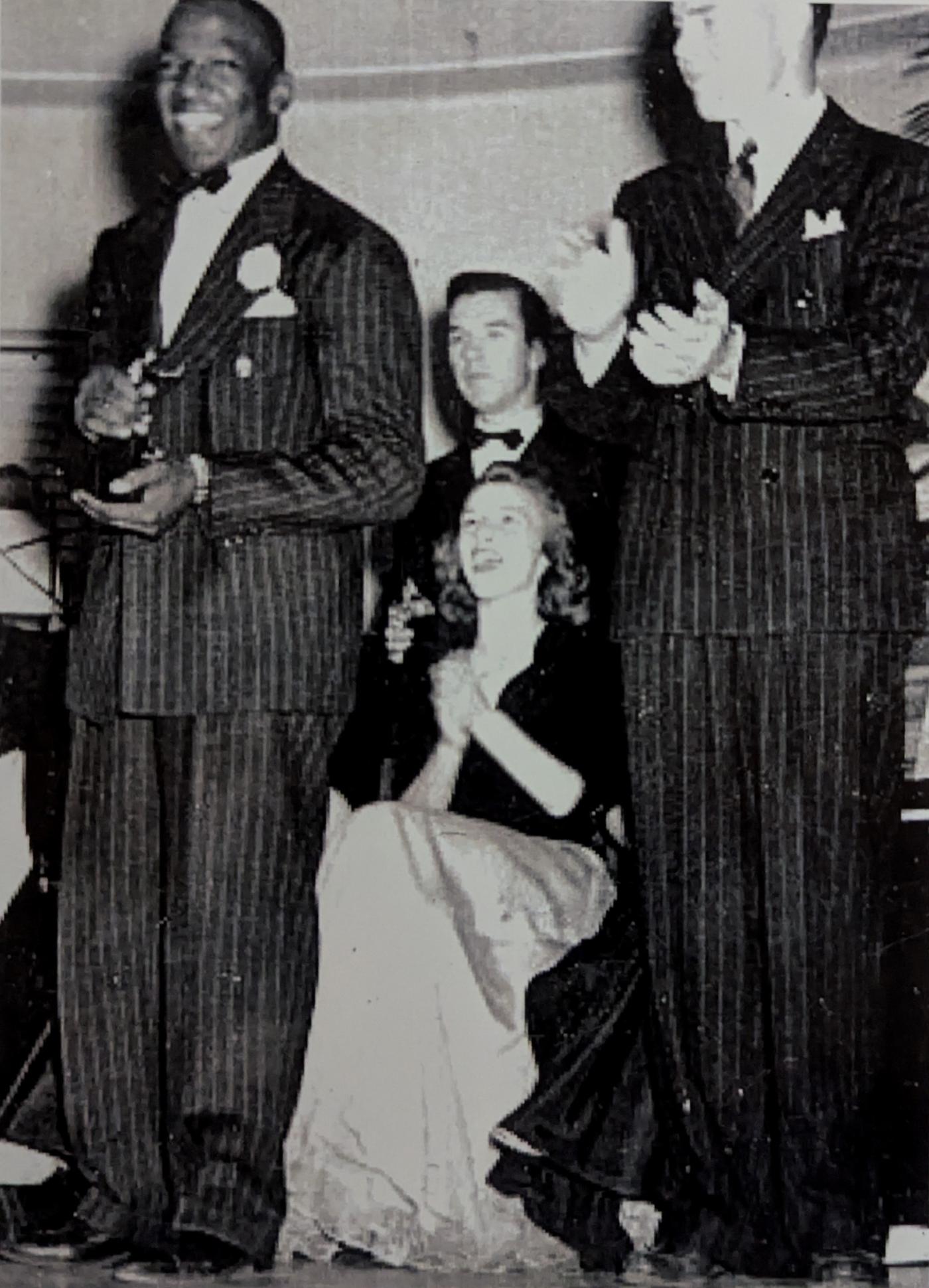 John Mosley Jr., seen here accepting an award on stage, performed in theatrical productions during college. Source: Mosley Family Collection