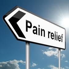 Sign with arrow that says "pain relief"