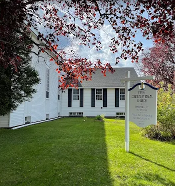 A white building with black shutters