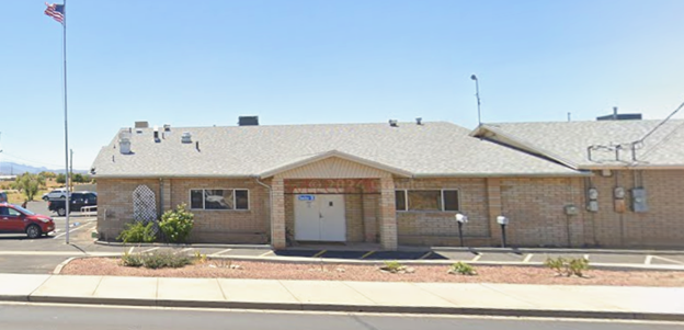Tan Brick Building on the South Side of Airway