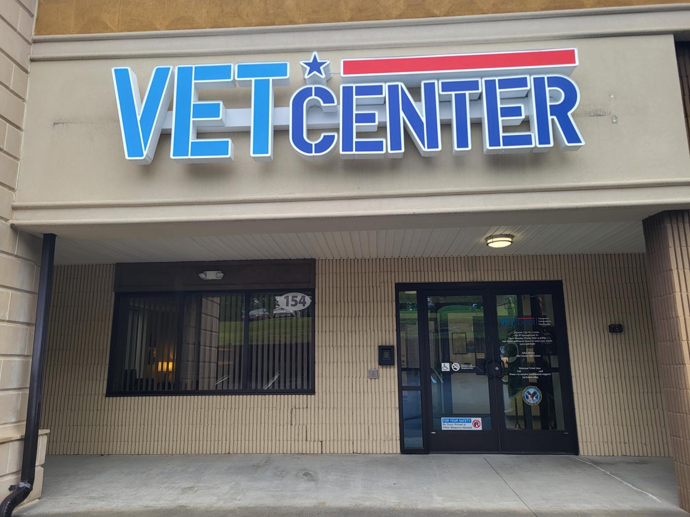 Vet Center storefront with blue and red sign.